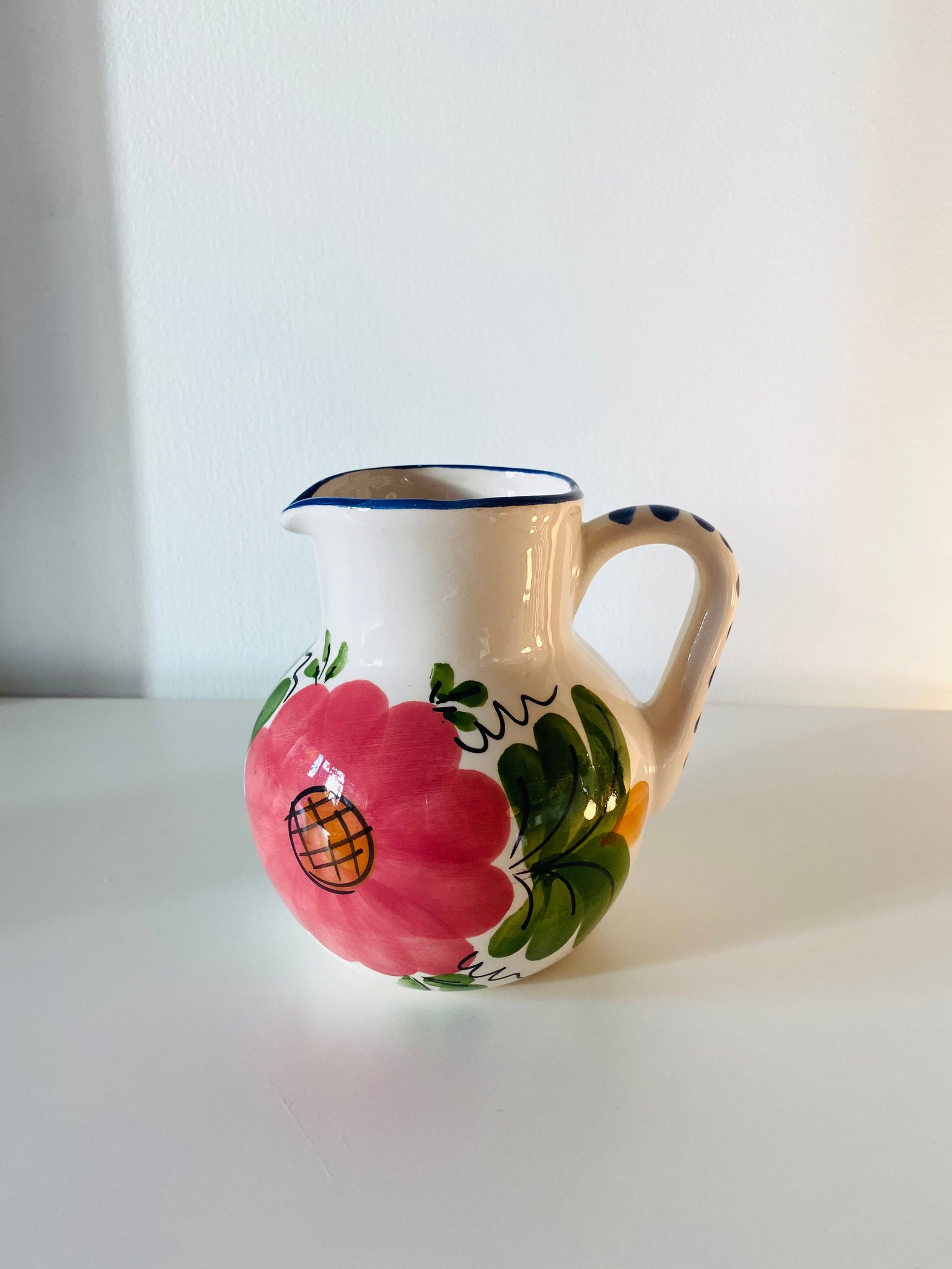 Ceramic mini-pitcher with floral design