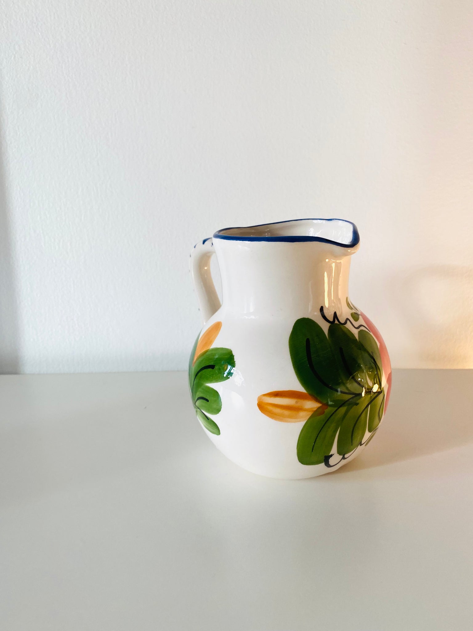 Ceramic mini-pitcher with floral design