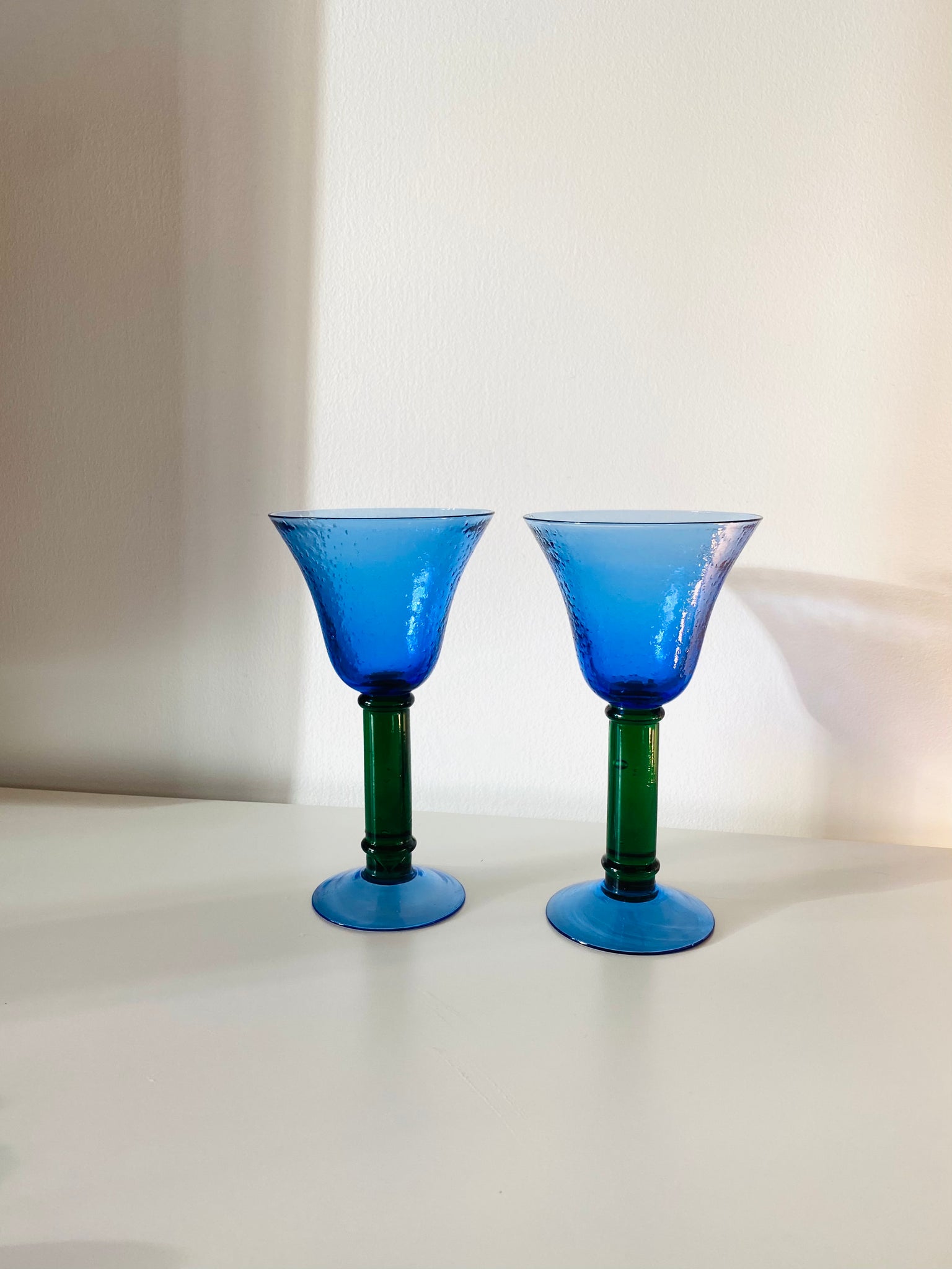 Set of 2 hand blown art glass drinking glasses blue with green stem